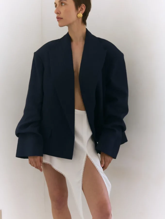 Спідниця Bazhane міні з розрізом та мереживом молочний