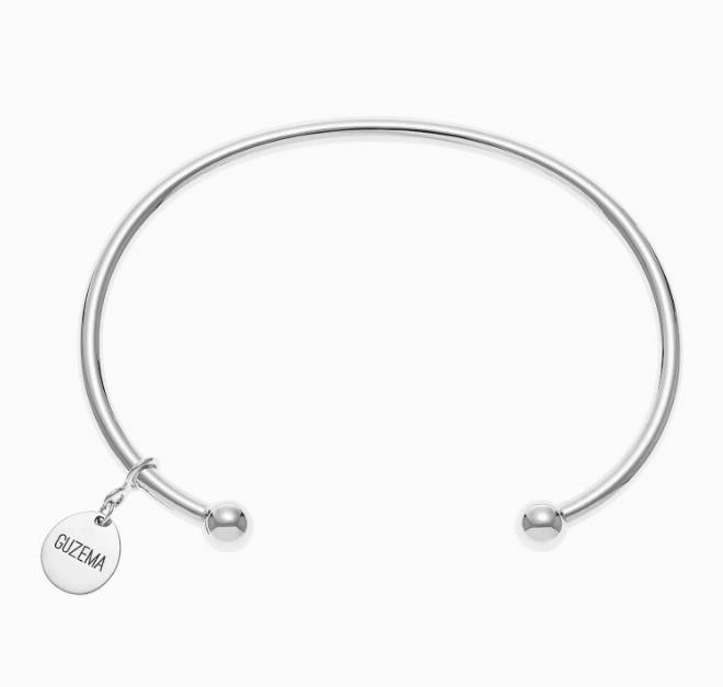 Браслет-дуга з клюшкою біле золото M SC 01